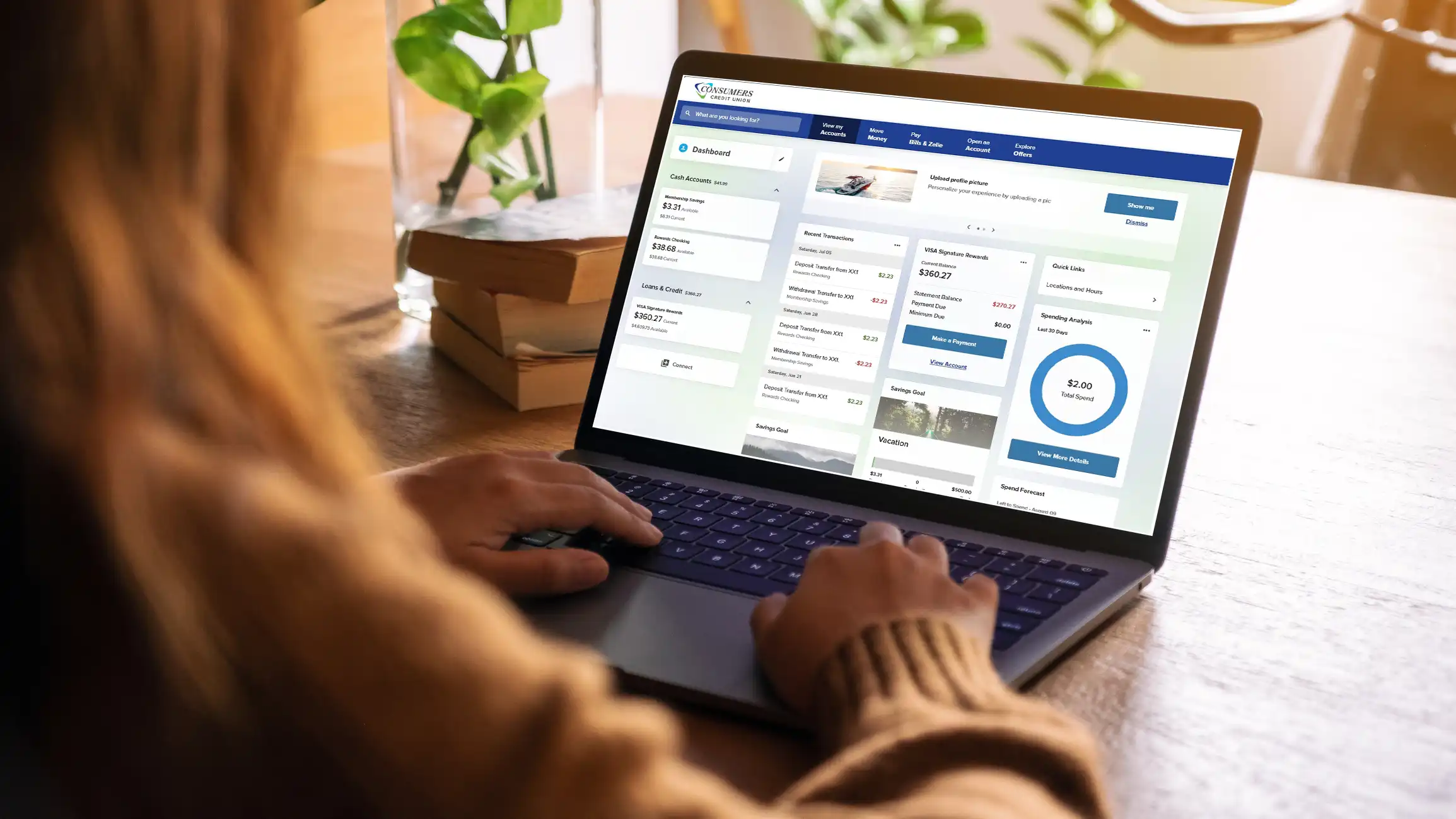 GettyImages-1163084921 Woman on laptop using new CCU digital banking platform
