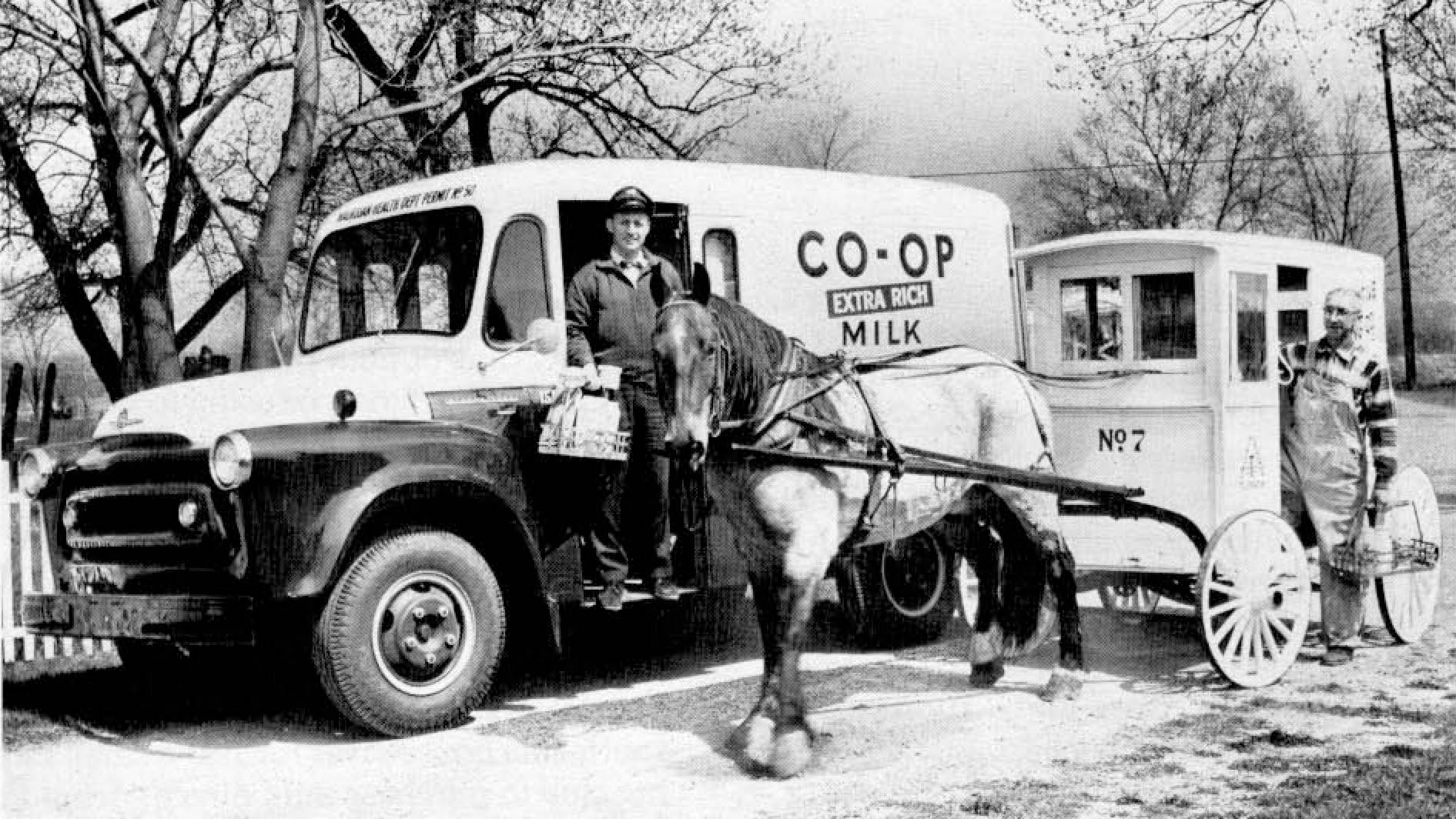 The delivery of milk changes shape from the horse and wagon to the motorized vehicle, May 11, 1956.